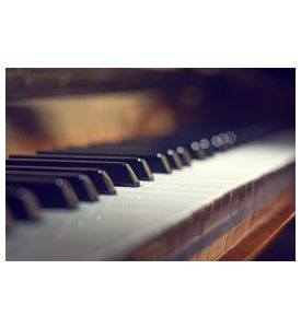Piano keyboard background with selective focus Warm colors - ID # 236067421